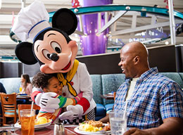 Chef Mickey mouse dines with guests contemporary resort