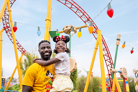 Father and girl in Toy Story land